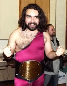 Wrestler Buck Gunderson wearing the Brass Knuckles Belt